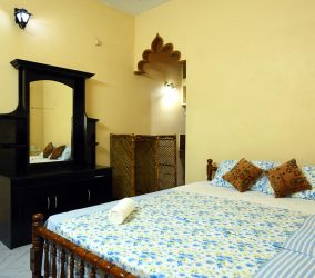 ideal ayurvedic resort bed room 2