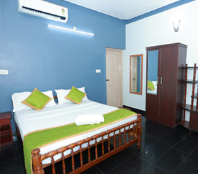ideal ayurvedic resort bed room 2